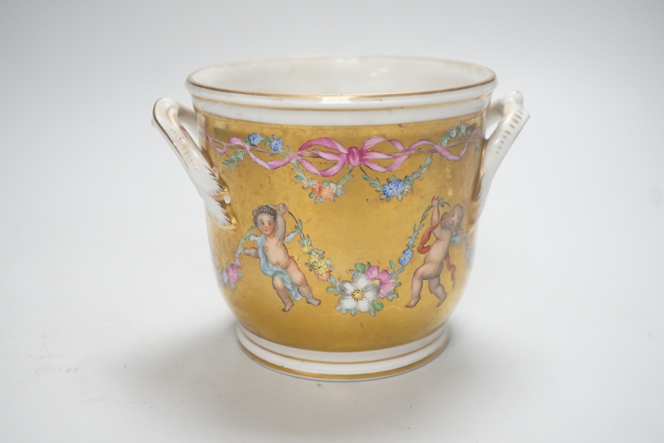 A late 19th century gilded Dresden cherubic jardiniere, 11cm